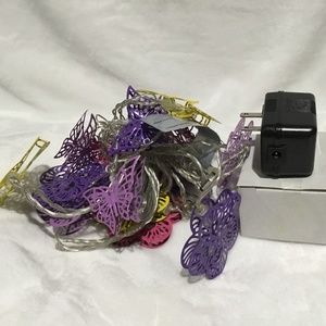 Cute flowers and butterflies lights with adapter for indoor use only. Brand new.